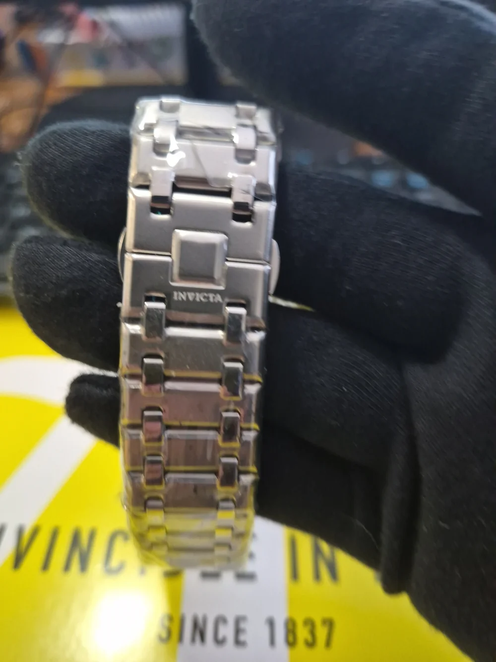 Invicta Silver Stainless Steel Watch with Red Accent